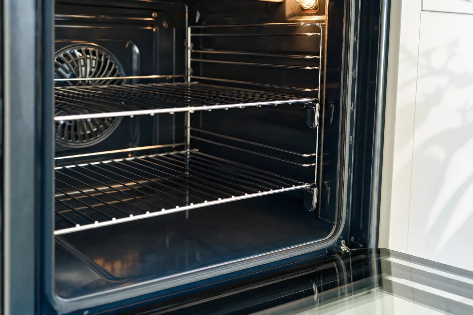 A degreased oven cavity with bright clean racks