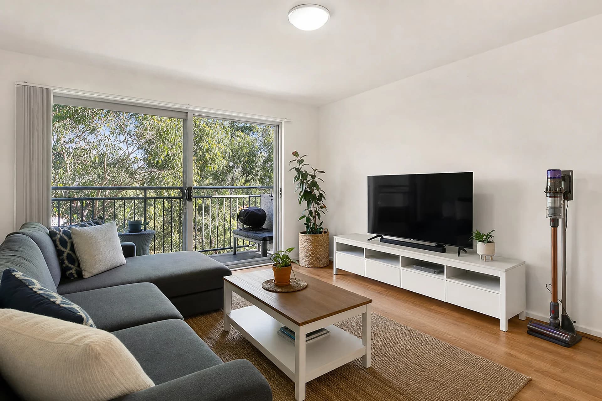 A tidy occupied rental lounge room ready for a routine inspection